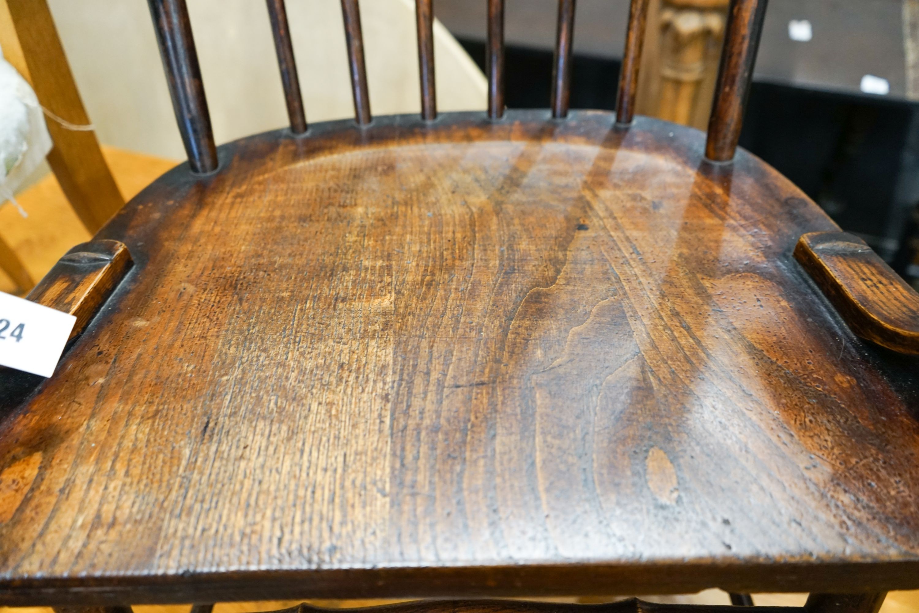 An early 20th century American elm and beech comb back armchair, width 57cm, depth 48cm, height 106cm